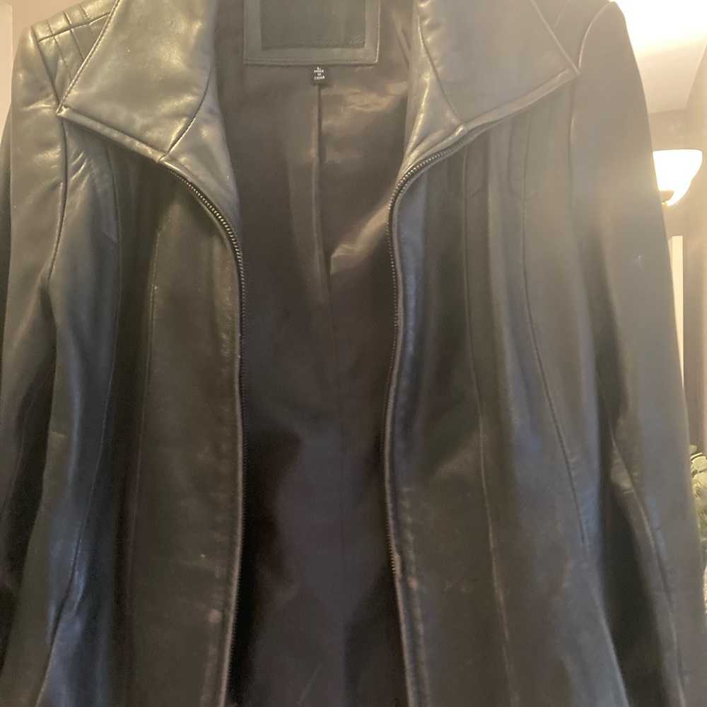 Woman’s size L black leather jacket